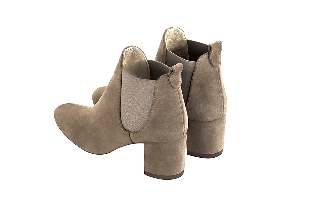 Tan beige and taupe brown women's ankle boots, with elastics. Round toe. Medium block heels. Rear view - Florence KOOIJMAN